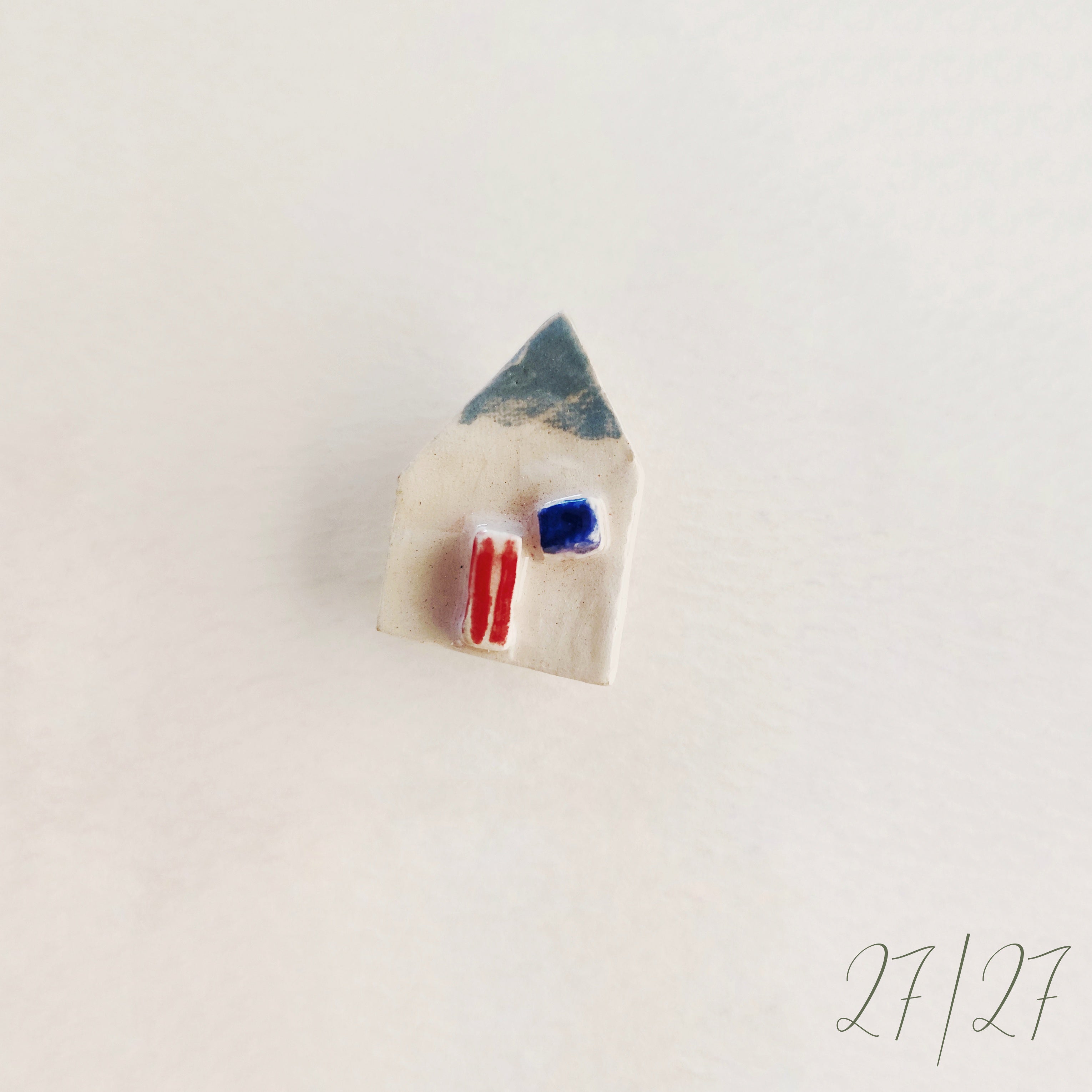 Broche de cerámica