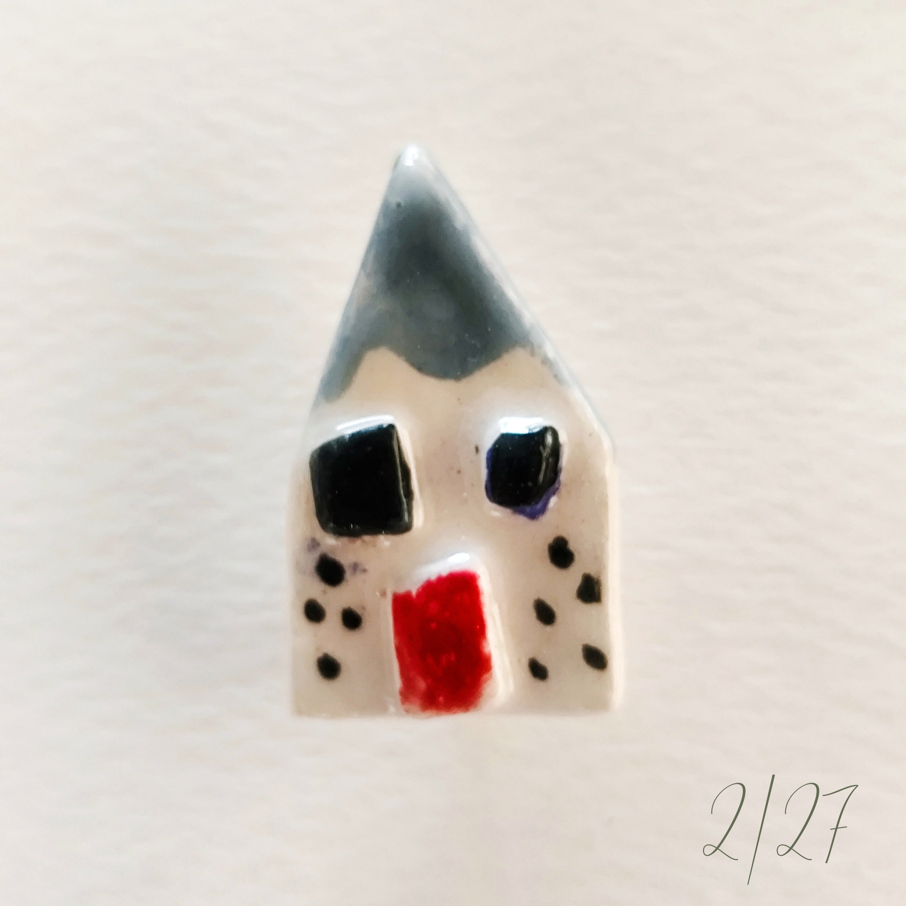 Broche de cerámica