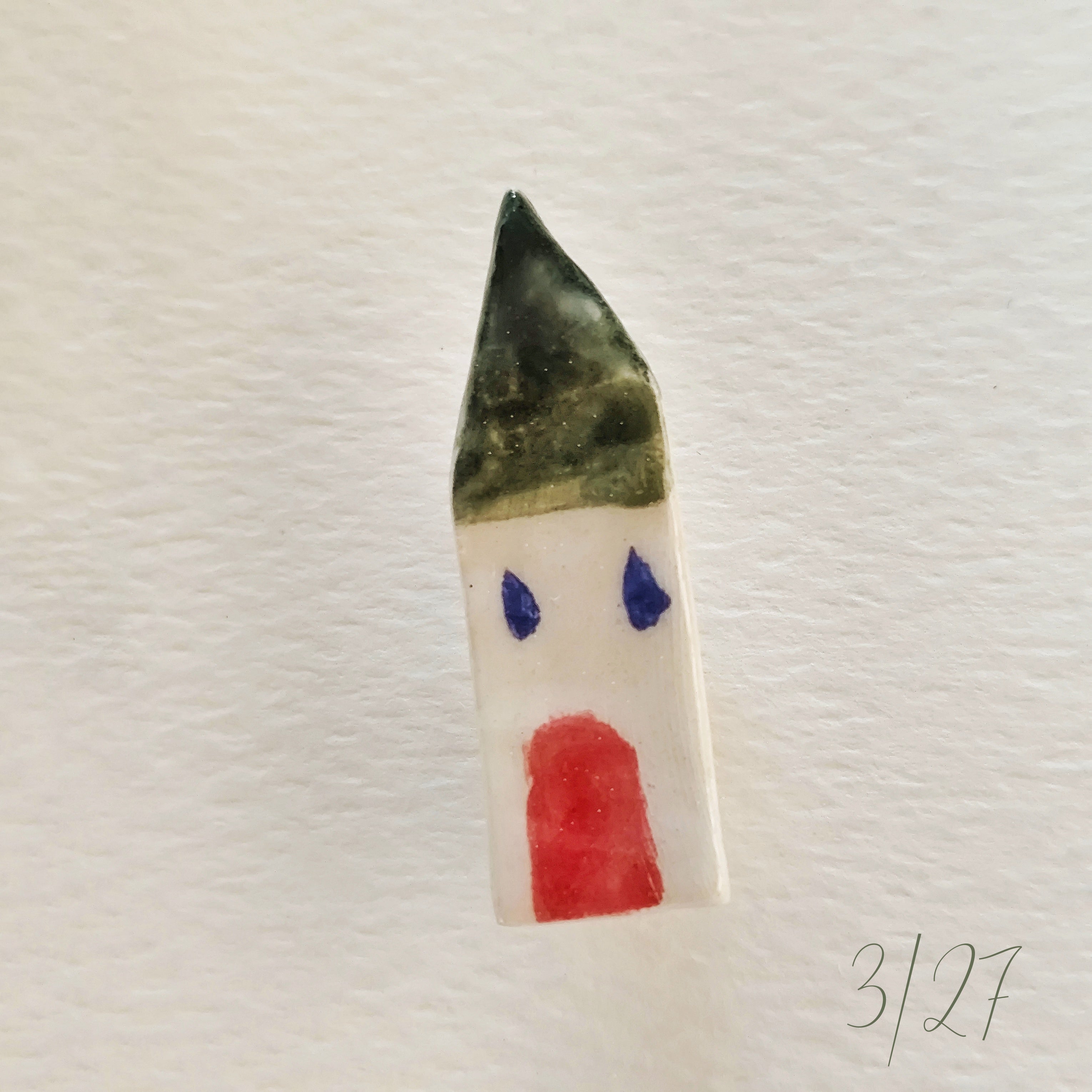 Broche de cerámica
