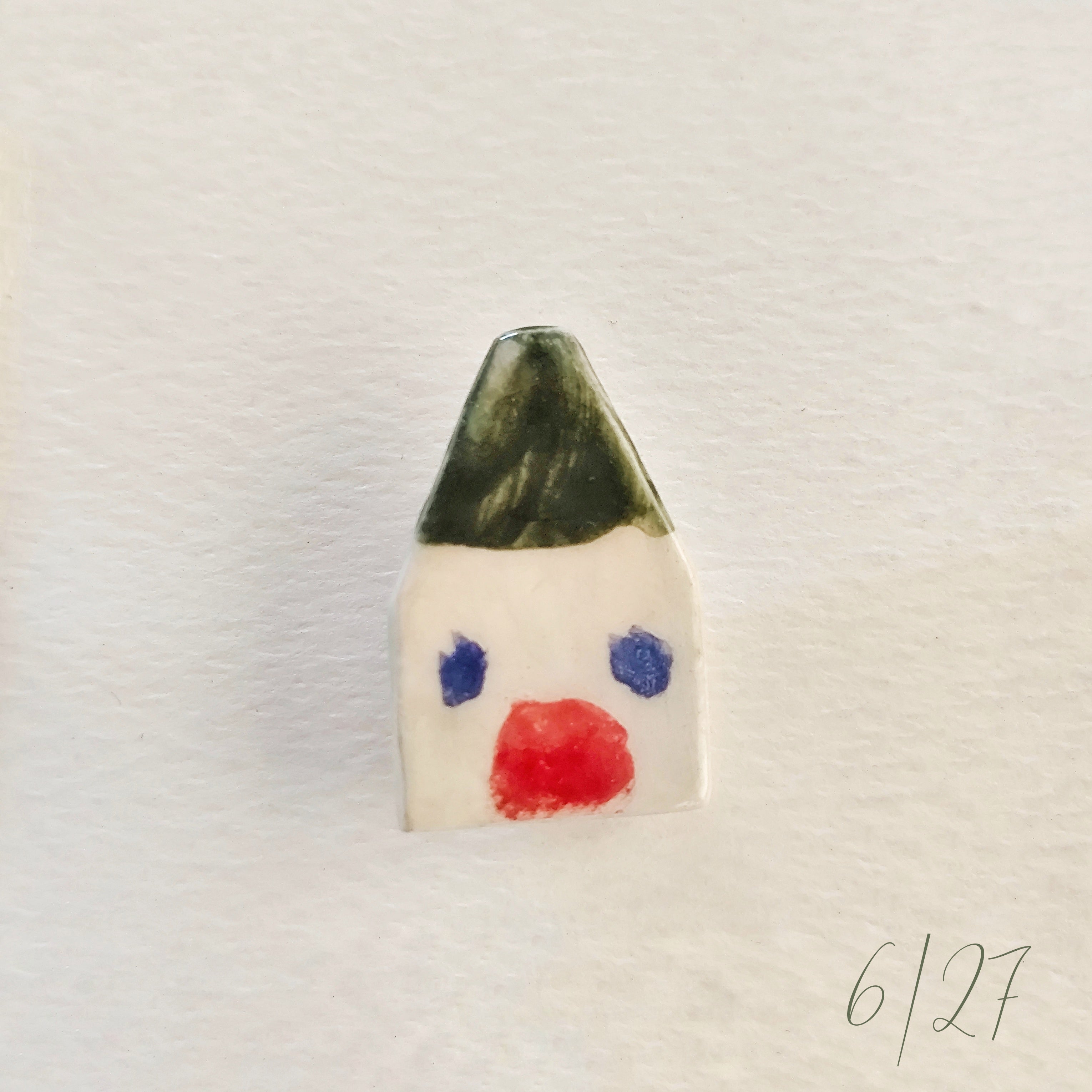 Broche de cerámica