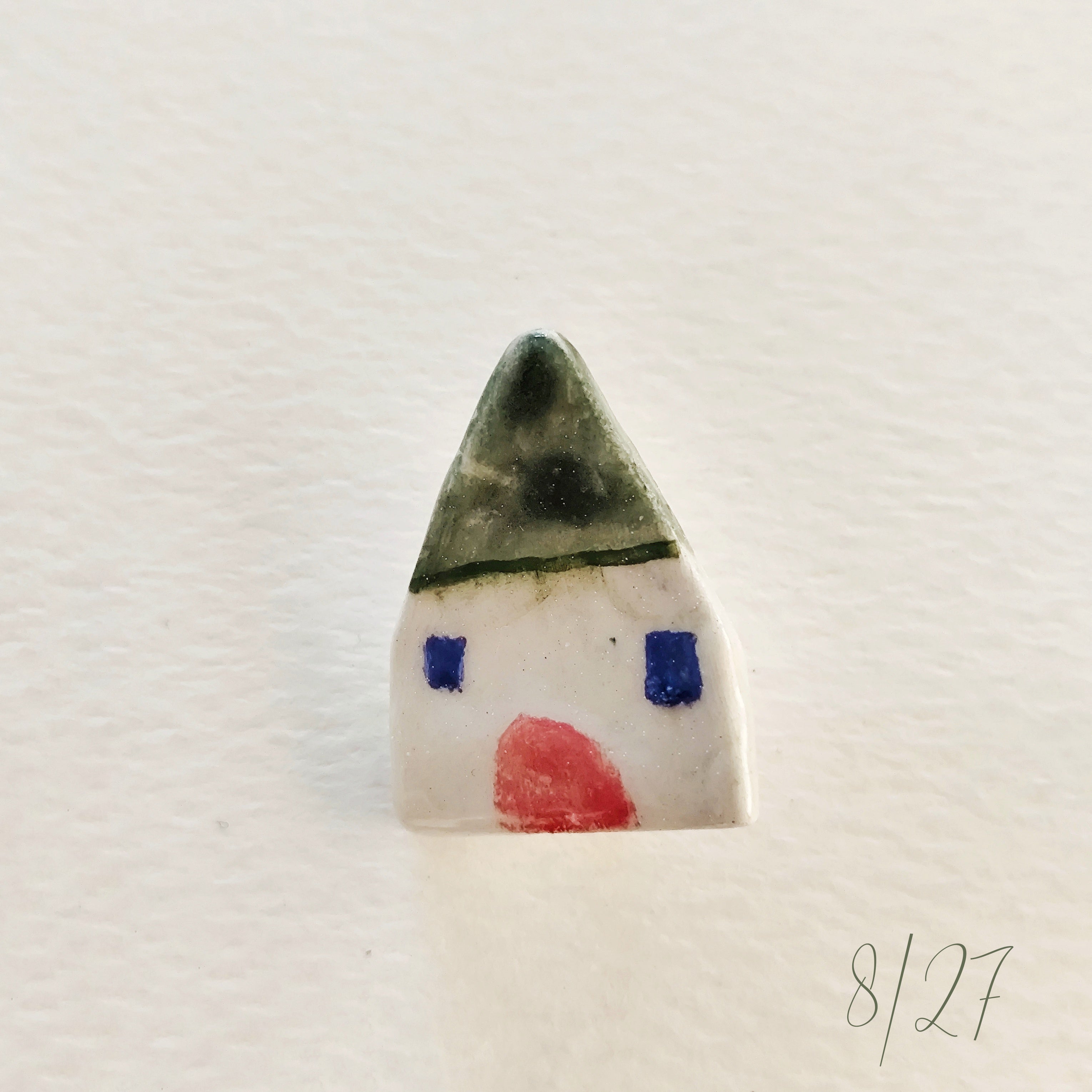 Broche de cerámica