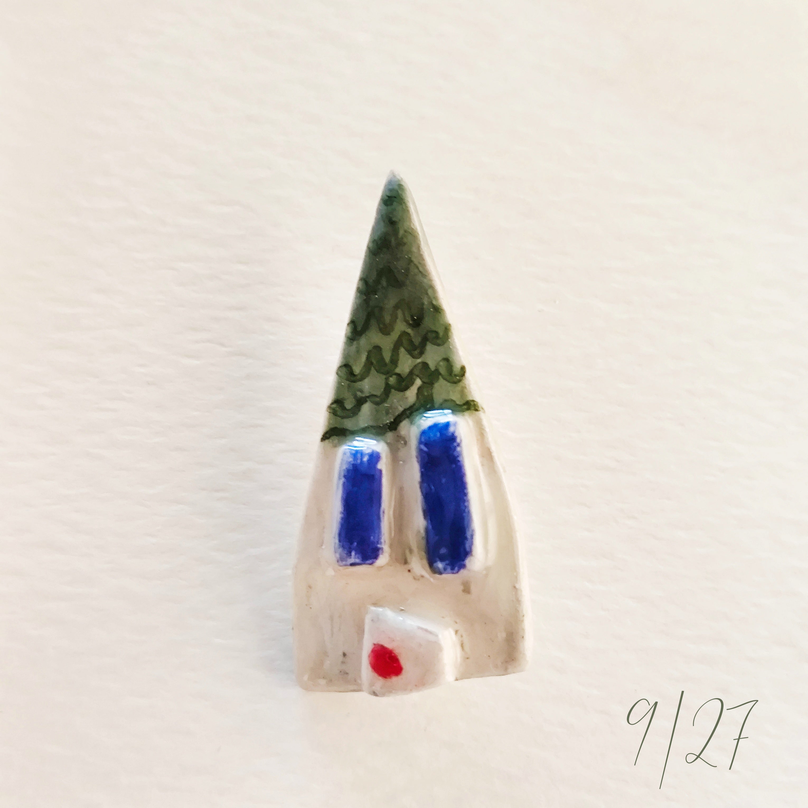 Broche de cerámica