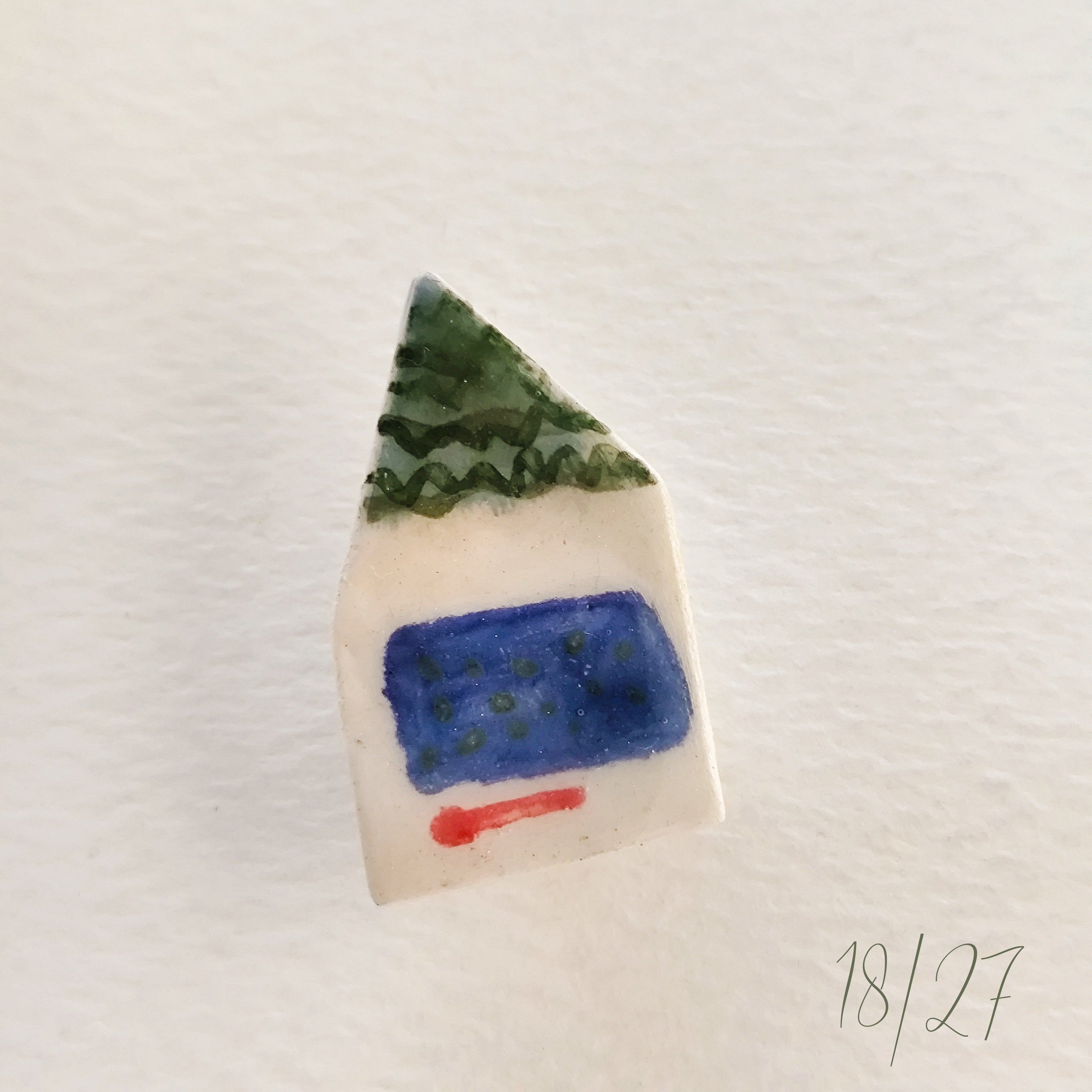 Broche de cerámica